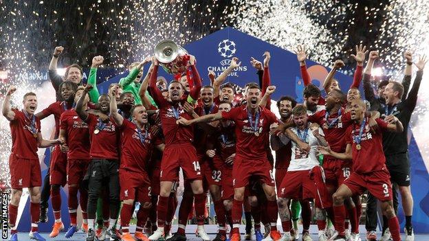 Jordan Henderson and Liverpool team-mates celebrate winning the Champions League