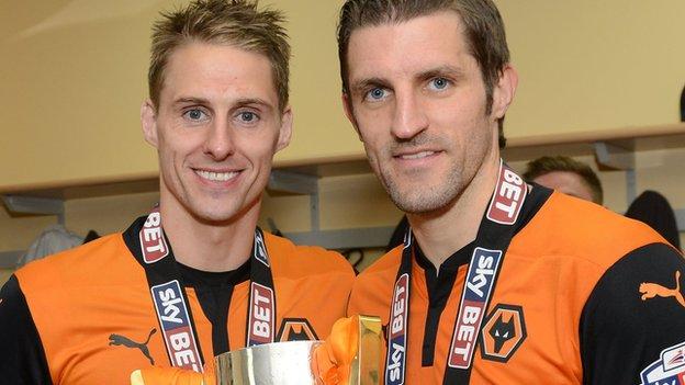 Sam Ricketts (right) and Dave Edwards celebrate winning the League One title with Wolves in 2013-14