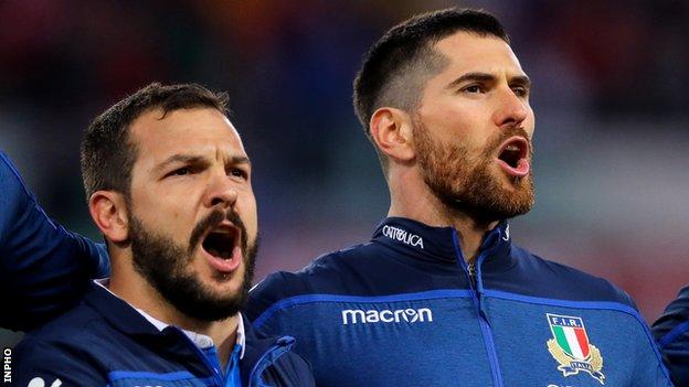 Ian McKinley (right) sings the Italian anthem alongside Guglielmo Palazzani before the Six Nations game against Wales last year