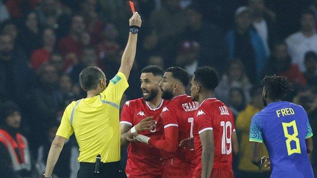 Tunisia had a man sent off against Brazil, a game where the South Americans' anthem was booed and a banana thrown at one of their players