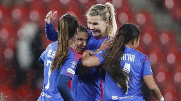 Lyon celebrate scoring a goal