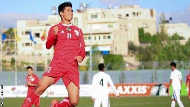 Yashir Pinto celebrates scoring for Palestine