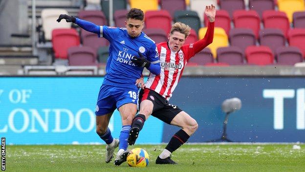 Fin Stevens battles with Cengiz Under during Leicester's FA Cup win over Brentford on 24 January