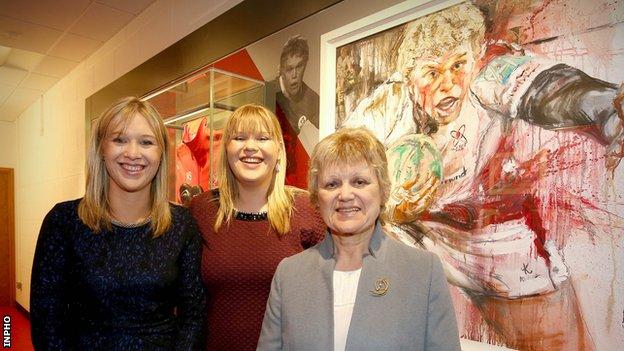 Nevin's sisters Emma and Laura and mother Essie pictured at the opening of the Nevin Spence Centre at Ravenhill in August 2015