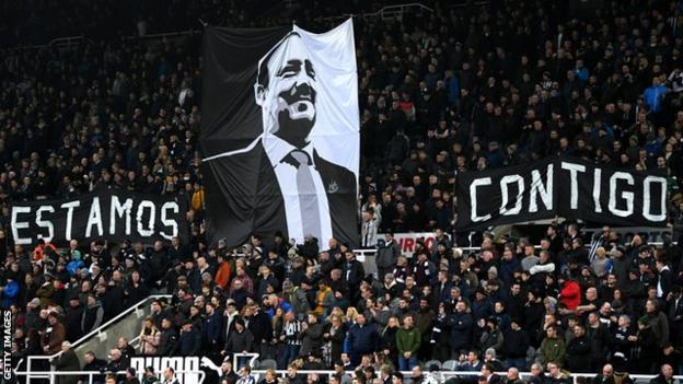 Newcastle fans display a banner in support of Rafael Benitez