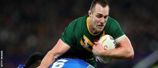 Isaah Yeo rides the tackle of club teammate Jarome Luai in the World Cup final