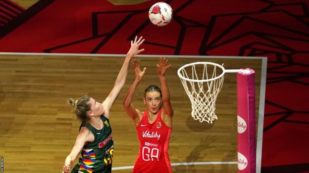 England's Berri Neil takes a shot against South Africa in Manchester
