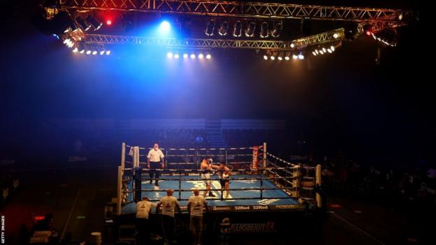 View of the ring and two fighters in it at the Telford International Centre