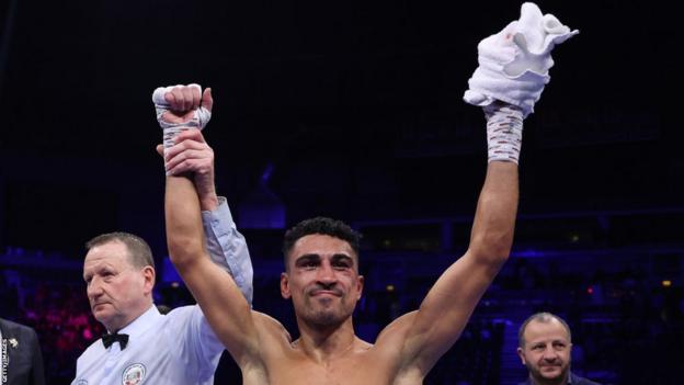 Jordan Gill is declared the winner by referee Howard Foster after the Belfast contest