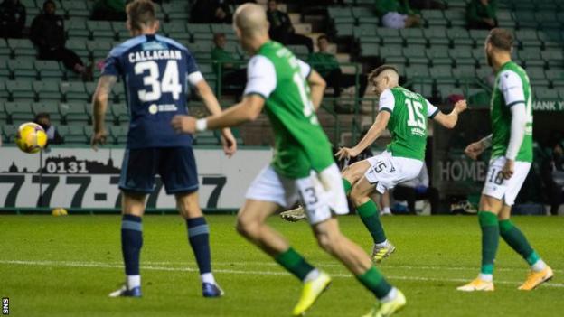 Kevin Nisbet opens the scoring for Hibs