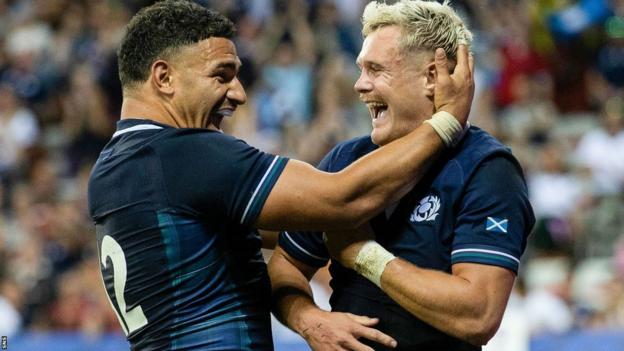 Scotland's Sione Tuipulotu and Darcy Graham