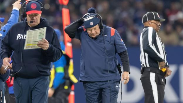 New England Patriots head coach Bill Belichick looking downcast