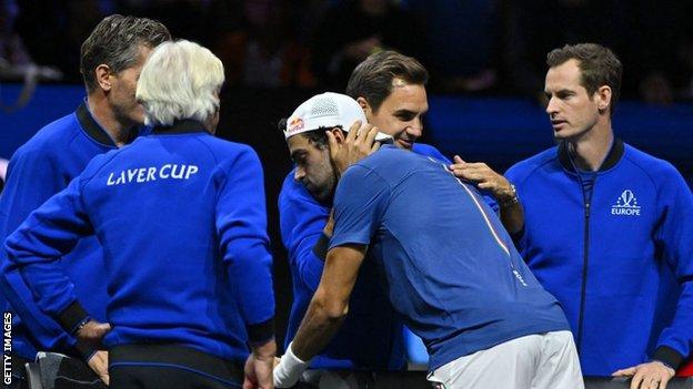 Roger Federer hugs Matteo Berrettini during the Laver Cup on Saturday