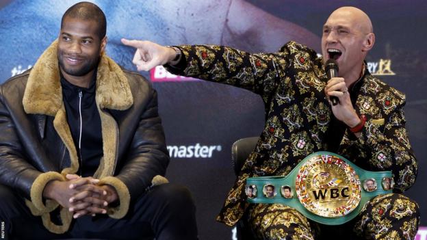 Daniel Dubois sits beside Tyson Fury at a press conference