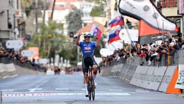 Mathieu van der Poel celebrates as he crosses the finish line