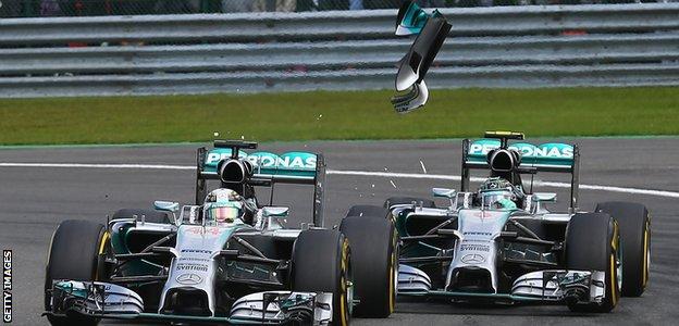 Lewis Hamilton and Nico Rosberg collide at the 2014 Belgian Grand Prix