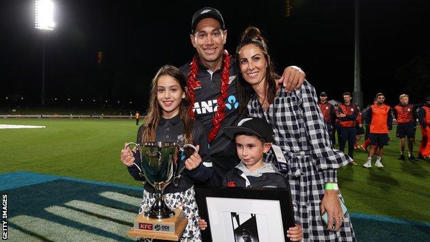 Ross Taylor and family on the pitch after the game