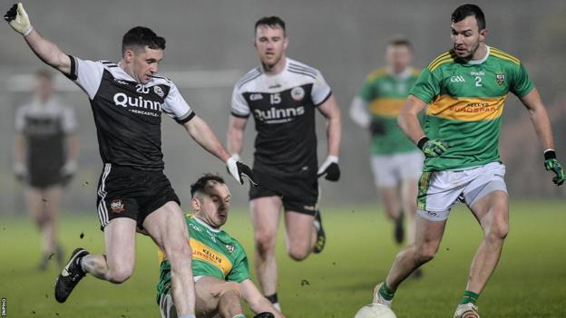 Kilcoo's Darryl Branagan battles with Glen's Conor Carville and Michael Warnock in last year's Ulster Club semi-final