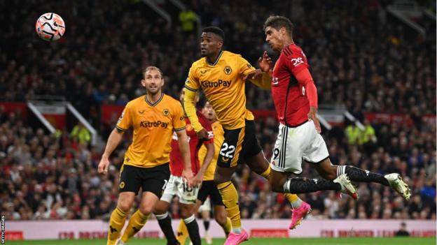 Raphael Varane heads home for Manchester United against Wolves