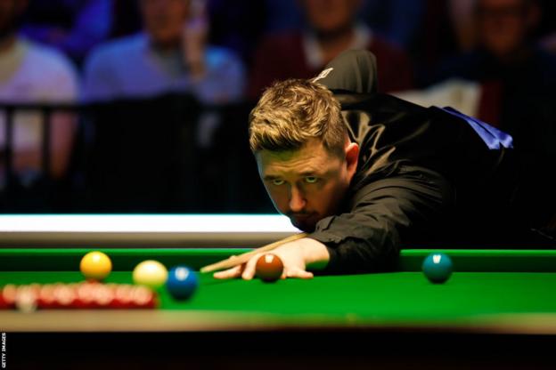 Kyren Wilson plays a shot on the way to his fourth maximum break of his career
