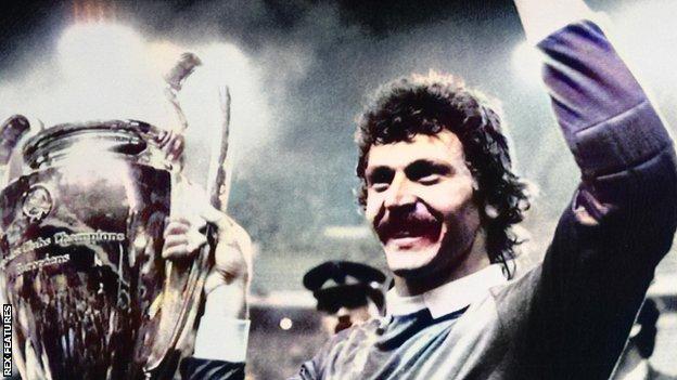 Steaua keeper Helmut Duckadam celebrates with the European Cup trophy in 1986