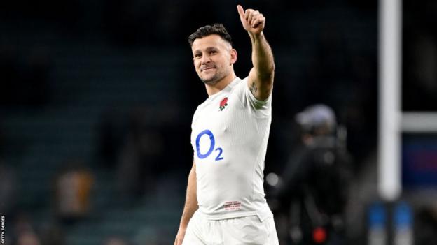 Danny Care waves to the crowd after England's win over Ireland