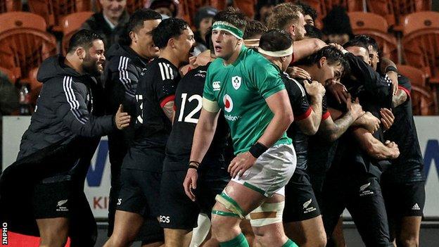 Maori All Blacks celebrate a try against Irleand