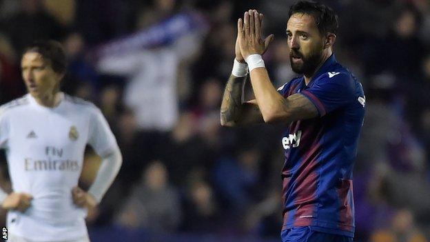 Jose Luis Morales applauds the Levante fans as he is substituted against Real Madrid