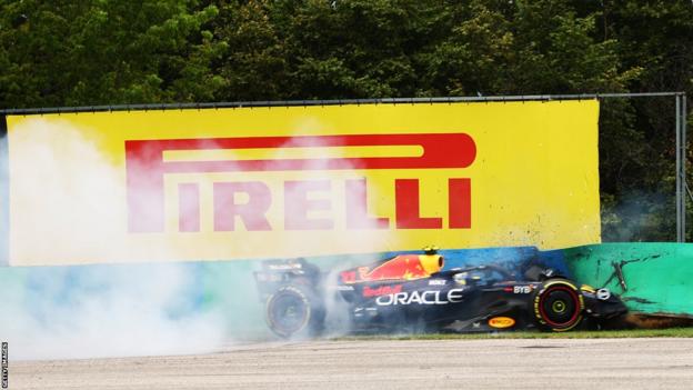 Red Bull's Sergio Perez crashes into the obstruction  during Hungarian GP archetypal  practice