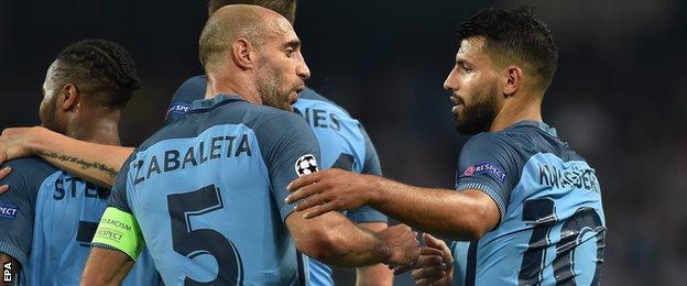 Pablo Zabaleta and Sergio Aguero celebrate with Manchester City