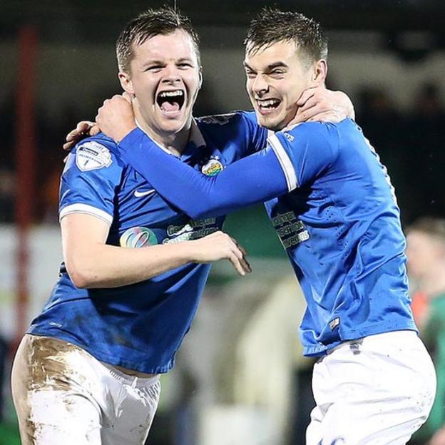Niall Quinn is congratulated by team-mate Matthew Clarke after scoring the first goal in Linfield's Boxing Day 2-1 win over Glentoran