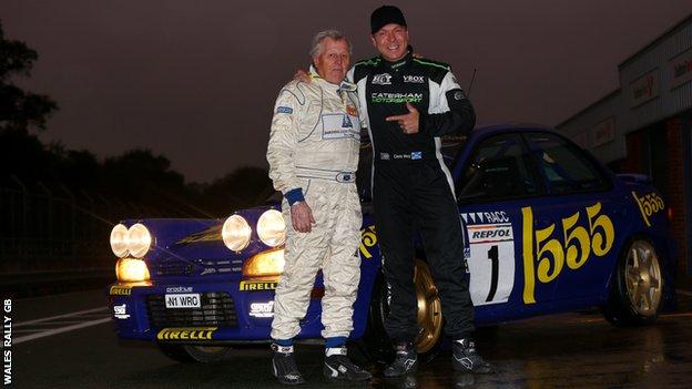 Chris Hoy and Jimmy McRae next to McRae's Rally Spain winning Subaru