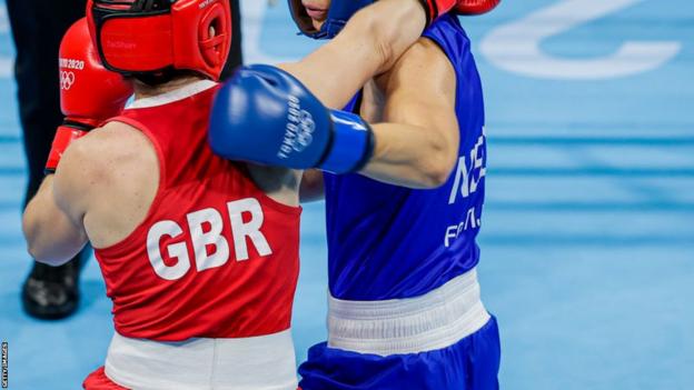 The back of a Great Britain boxer during the Olympic Games. The faces of the boxers cannot be seen