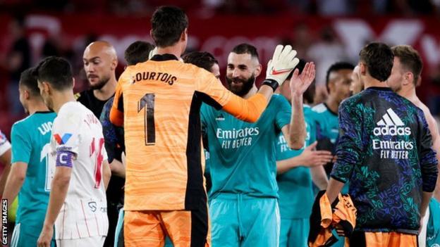 Thibaut Courtois and Karim Benzema