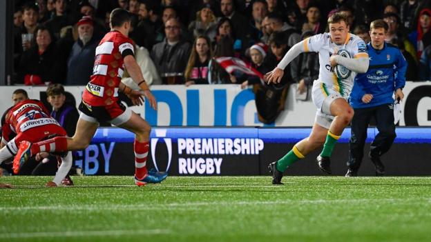 Saints centre Tom Litchfield goes in at the left corner for the match-winning try at Gloucester