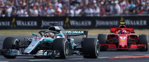 Mercedes" Lewis Hamilton (left) and Ferrari"s Kimi Raikkonen during the 2018 British Grand Prix