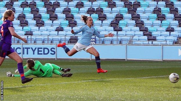 Manchester City's Gerogia Stanway scoring her first against Liverpool