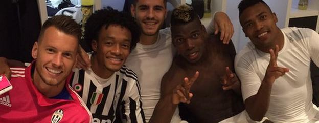 Juan Cuadrado celebrates with his team-mates Juventus' derby win over Torino