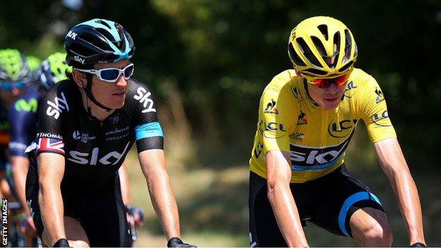 Geraint Thomas and Chris Froome ride alongside each other during the 2015 Tour de France
