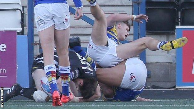 Joe Mellor evaded some acrobatic Leeds defending to get the ball down for the first Widnes try
