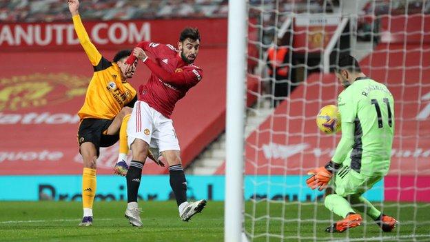 Bruno Fernandes sees his shot saved by Wolves keeper Rui Patricio