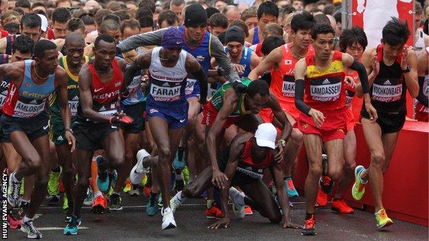 Mo Farah at the start of the World Half Marathon in Cardiff as eventual winner Geoffrey Kamworor falls