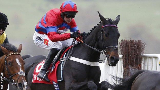 Nico de Boinville riding Sprinter Sacre on their way to winning The Shloer Steeple Chase at Cheltenham