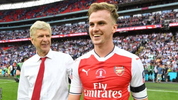 Rob Holding and Arsene Wenger celebrate winning the FA Cup