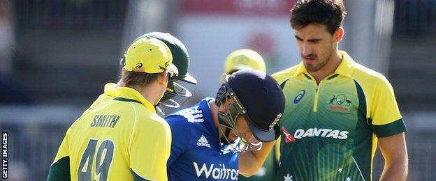 Australia's fielders show concern after Eoin Morgan is hit
