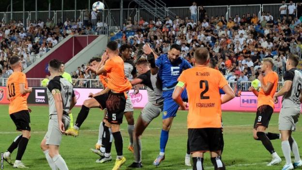 Goalmouth action from the first leg of the Europa Conference League tie in Pristina