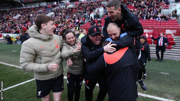 Matt Beard's staff celebrate