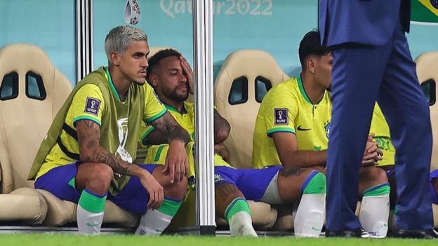 Neymar crying on the bench in Brazil