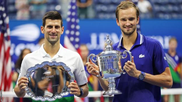 Novak Djokovic and Daniil Medvedev with their trophies aft  Medvedev bushed  Djokovic successful  the US Open last  successful  2021