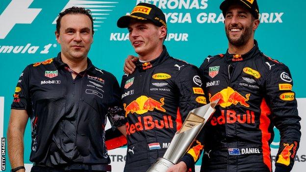 Dan Fallows celebrates with Red Bull racers Max Verstappen and Daniel Ricciardo